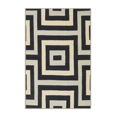 Tapis géométrique noir / beige