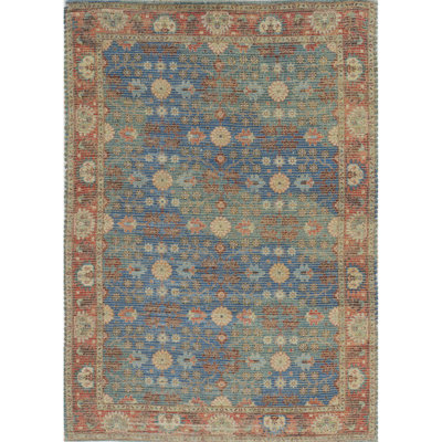 Doletha Blue and Beige Floral Hand Woven Area Rug