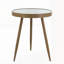 Élégante table d'appoint ronde avec plateau en verre et pieds fuselés or antique, parfaite pour un décor moderne et polyvalent.