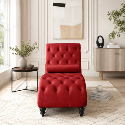 Fauteuil inclinable en velours capitonné