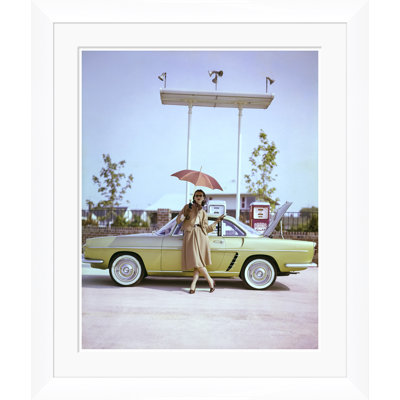Vogue Magazine, "Model in Front of a Gold Renault Caravelle," Jerry Schatzberg, August 1, 1959 Framed Photographic Print