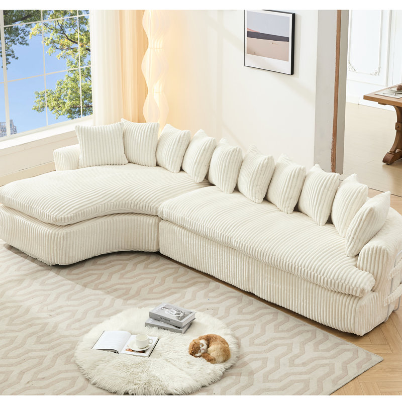 Canapé modulaire beige en L avec dossier élégant