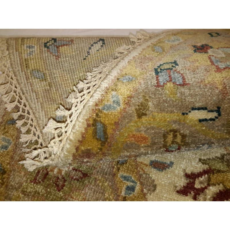 Katline Oriental Area Rug in Beige