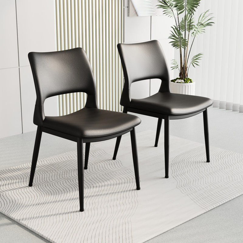 Ensemble de 2 chaises de salle à manger en similicuir noir, siège et dossier ergonomiques, pour la maison et le bureau. Design élégant.