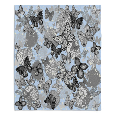 Couverture sherpa doux bleu pâle papillons