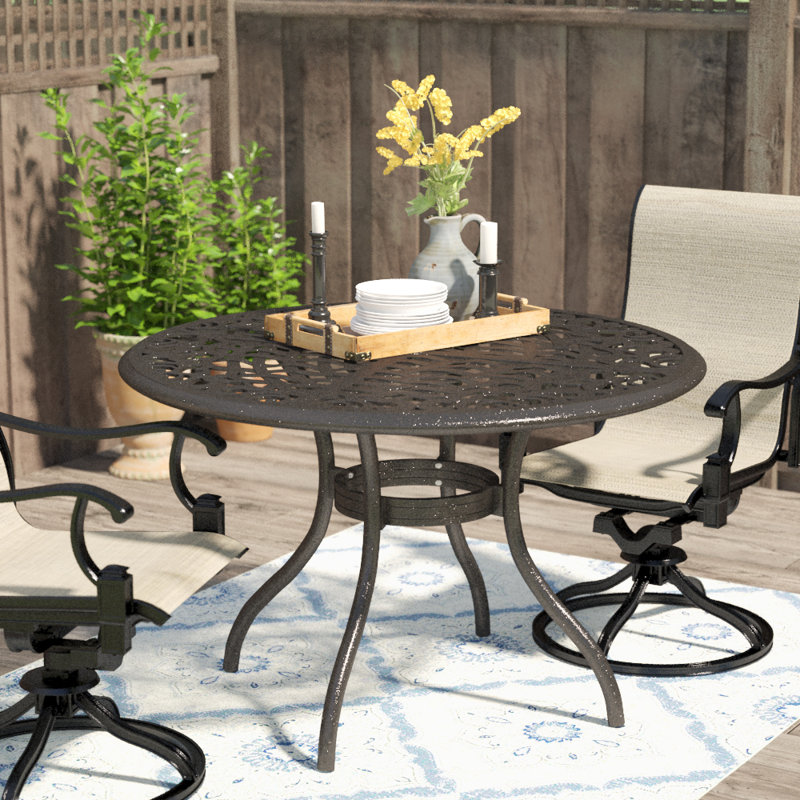 Usrey Round Metal Outdoor Dining Table With Umbrella Hole , 47.75'' in. W 47.75'' in. D, Hammered Bronze