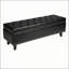 Banc de rangement avec repose-pieds capitonné avec pieds en bois, compartiment caché spacieux et assise confortable en similicuir noir