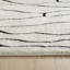 Tapis d'intérieur crème abstrait à motif de branches Tapis Alinda-16635911