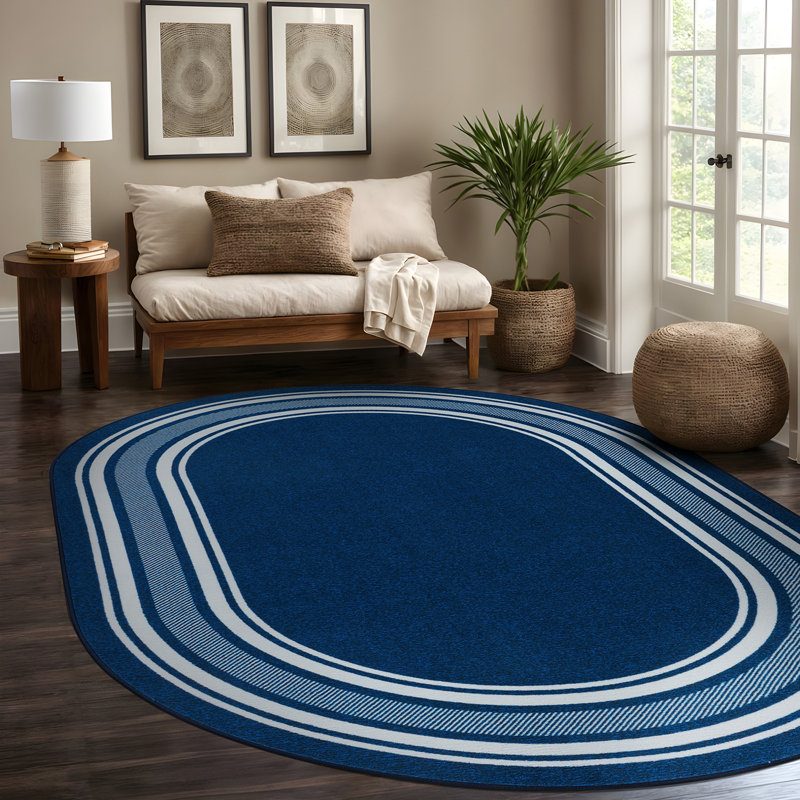 Tapis bleu foncé Quinnipack, Ovale 5 pi x7 pi
