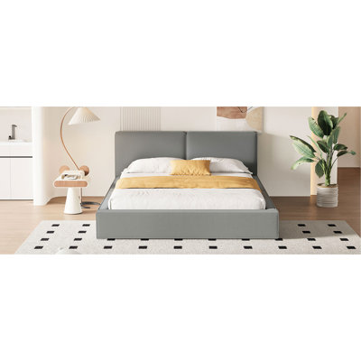 Grand lit plateforme moderne en velours gris avec espace de couchage stable et solide