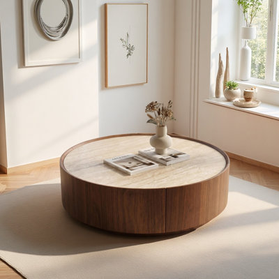 39.3 Round coffee table, with a sintered stone top featuring inlaid details, incorporating storage space
