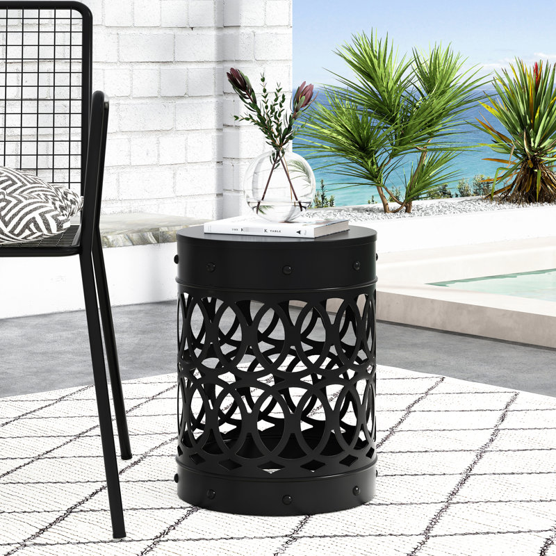 Grande table d'appoint d'extérieur en métal noir avec un style moderne et tendance et des éléments en fer découpé - Structure robuste