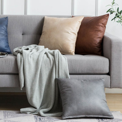 Ensemble de 4 housses de coussin en similicuir