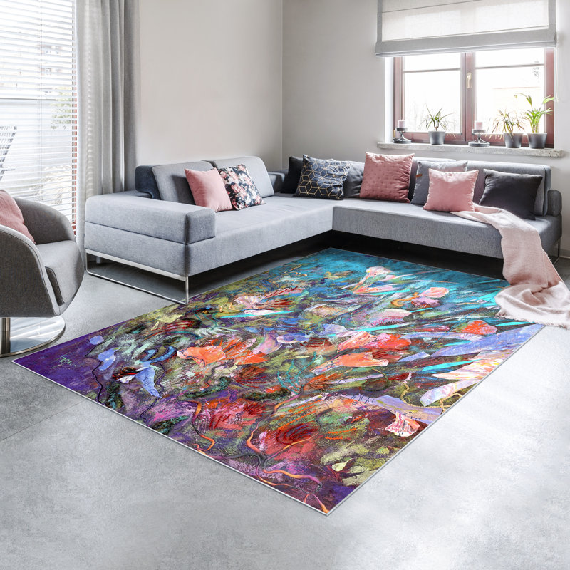 Tapis rectangulaire Divyan avec envers antidérapant