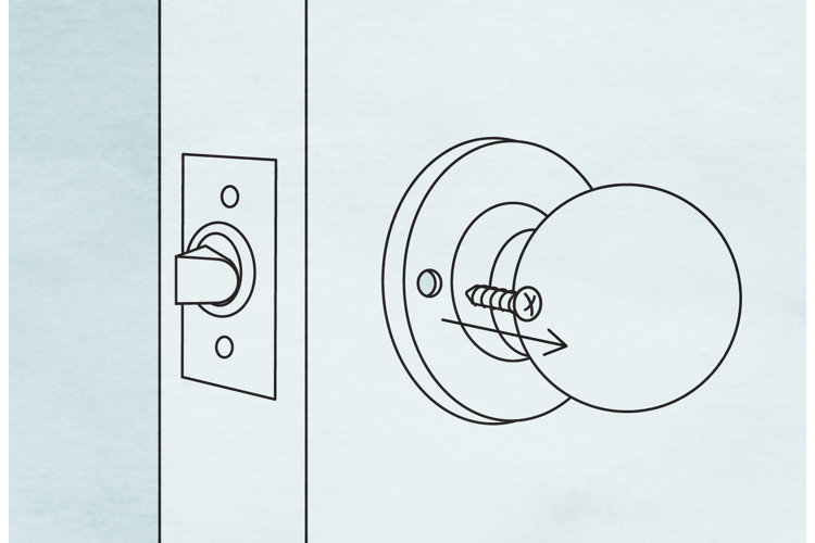 detaching old handle from door to install keyless lock