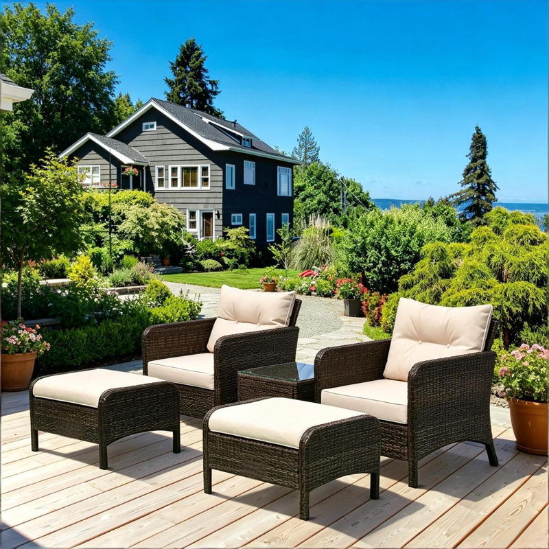 Ensemble de conversation pour patio 5 pièces en osier avec 2 chaises rembourrées, 2 repose-pieds et table basse en verre trempé