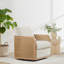 Fauteuil pivotant Juliette en rotin naturel capitonné