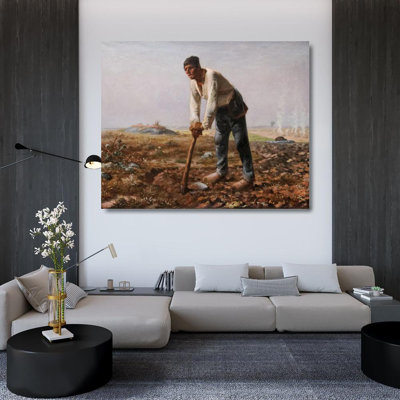 Homme avec une houe