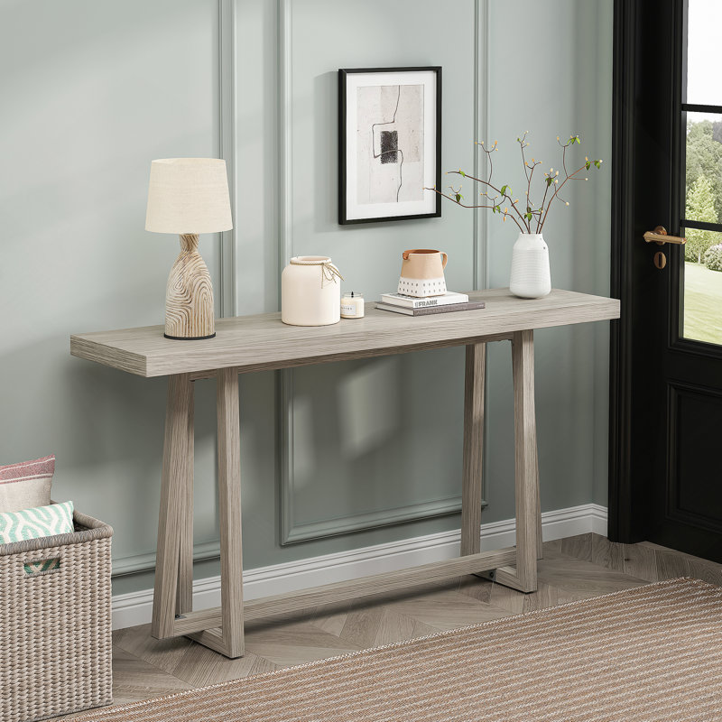 Élégante console rectangulaire pour plusieurs espaces, idéale pour exposer des décorations, des plantes ou comme poste de travail fonctionnel