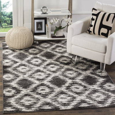 Mckee Geometric Area Rug