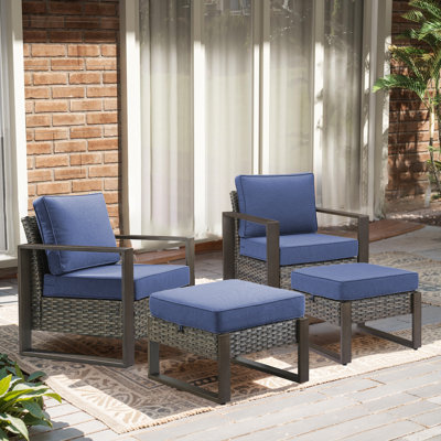 Ensemble de mobilier d'extérieur en osier Drazen résistant aux intempéries - 2 fauteuils club et 2 repose-pieds avec coussins