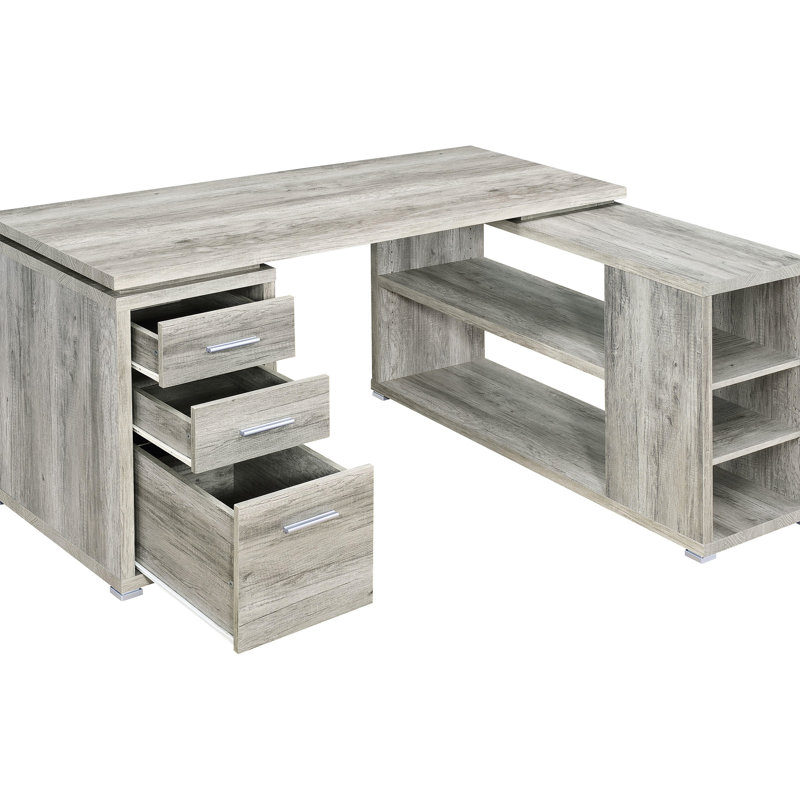 Bureau d'ordinateur en forme de L, style bois flotté gris, avec cinq étagères à l'aspect vieilli, idéal pour un bureau au charme rustique côtier.