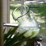 Ivy Bronx Traditional Round Large Glass Tilted Pitcher In Clear