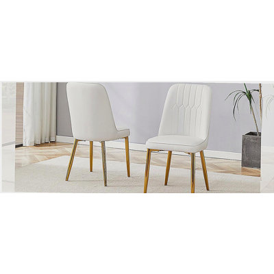 2 modern dining chairs, sleek PU leather backrest, and gold metal legs bring a comfortable home experience to the kitchen, bedroom, and office.W1151P183322