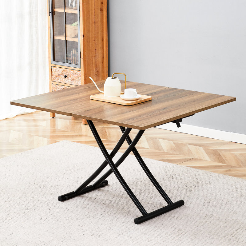 Table relevable multifonctionnelle avec pattes en métal noir de 2 cm d'épaisseur, aspect bois, idéale pour coiffeuse, bureau ou espace de travail. Coins arrondis, design moderne et épais. Utilisations multiples : table basse, table à manger, etc. Montage facile.