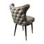 Chaise de club de cowboy à boutons capitonnée-117321627
