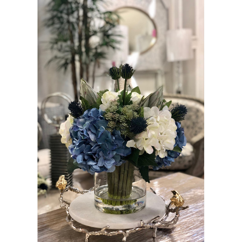 Assorted Hydrangeas with Thistle, Cactus and Protea in Glass Vase