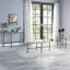 Table basse Brantley, verre transparent et finition gris sable