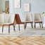 Chaises de salle à manger modernes en similicuir deux tons avec capitonnage géométrique et pieds en métal-824206098