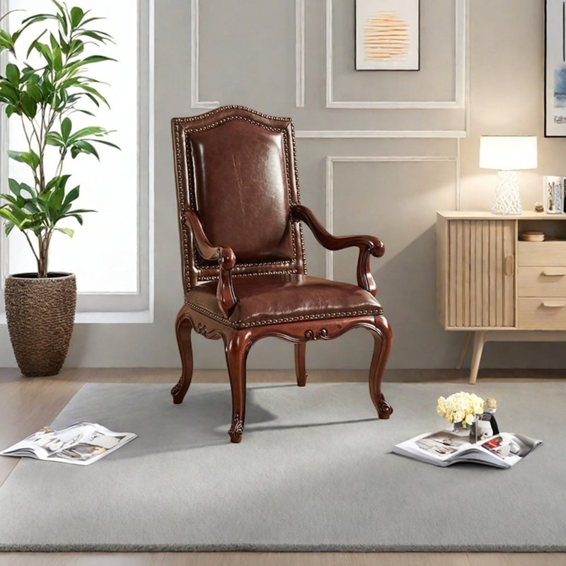 Fauteuil de luxe en simili cuir incrusté de rivets