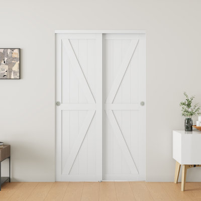 K-shaped Paneled Sliding Closet Doors with Hardware Kit, No Assembly Required K-Shape Manufactured Wood Closet Door
