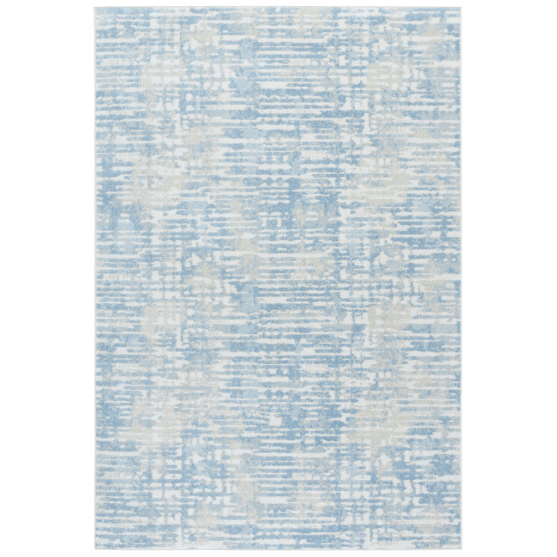 Ivory and Blue Abstract Synthetic Rectangular Area Rug