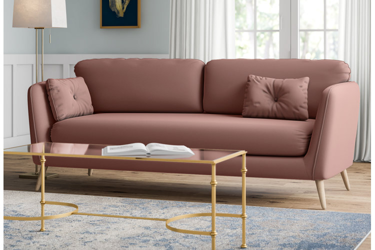 formal pink sofa in a glam living room