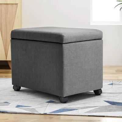 Rangement en tissu gris avec roulettes de mouvement pour un usage à la maison et au bureau
