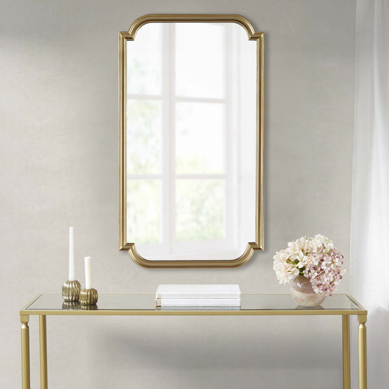 Miroir mural doré