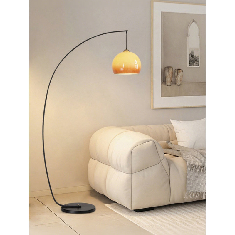 Mid-century modern style glass and wrought iron floor lamp.
