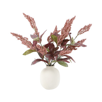 Arrangement de feuilles d'automne dans un vase