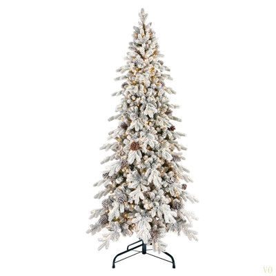 9FT Flocked PE/PVC Christmas Tree With 1250 Warm  LED Lights – 2138 Tips, 52 Natural Pine Cones, Snowy Effect, Hinged Branches, Metal Stand