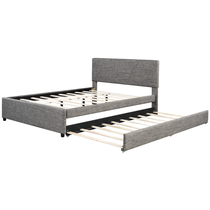 Lit plateforme tapissier très grand en lin gris et lit simple TG avec tête de lit à motif brique, lit stable, structure en bois