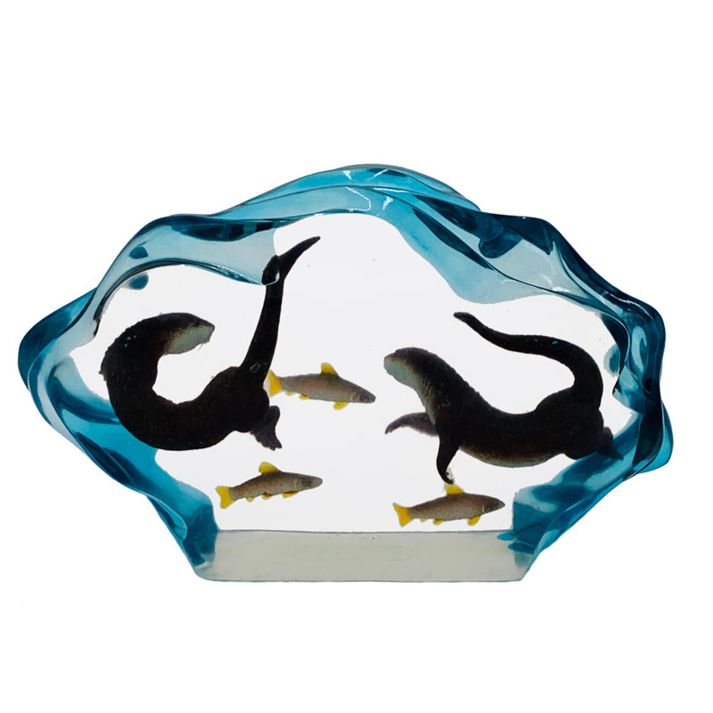 Loutre de mer Pitman avec poisson