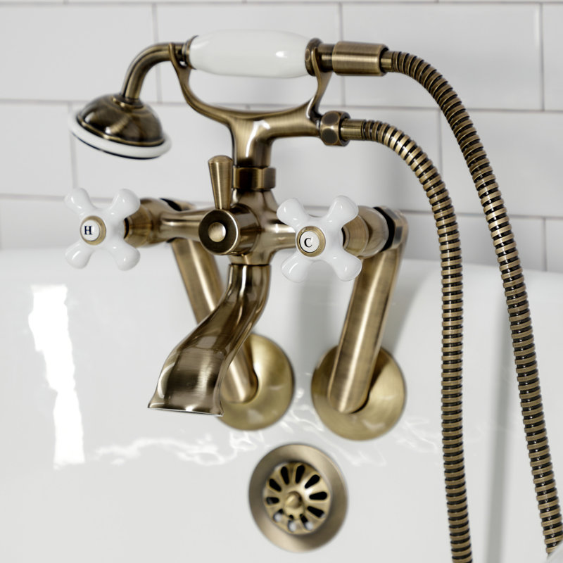 Kingston Brass Kingston Three-Handle 2-Hole Tub Wall Mount Clawfoot Tub Faucet with Hand Shower, Antique Brass