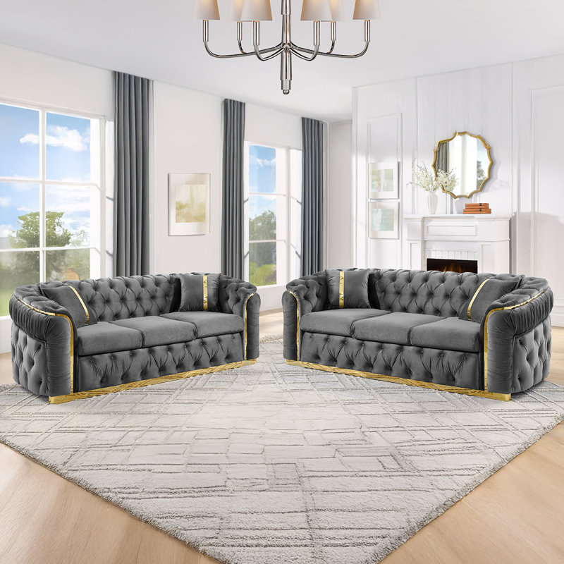 Luxueux canapés en velours gris avec des accents dorés pour la vie moderne