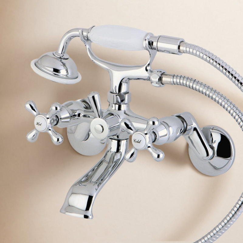 Robinet de baignoire sur pattes à deux poignées et à deux trous avec pomme de douche à main Kingston Brass, Chrome poli