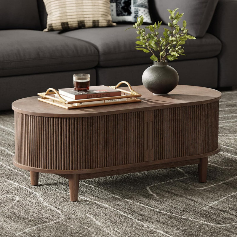 Table basse ovale en bois de noyer avec rangement pour porte de tambour coulissante cannelée, 39 po