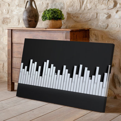 Canvas A Minimalist Black Background Featuring A Stylized City Skyline Made Wall Art Of White Piano Keys Creating A Striking Contrast Canvas Wall Art