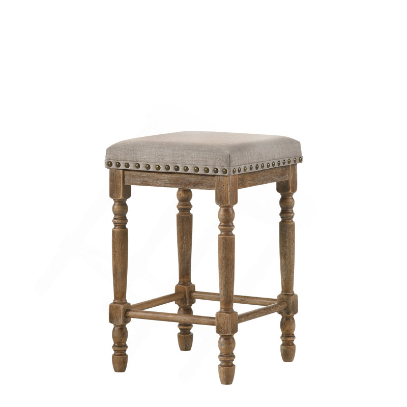 Tabouret à hauteur de comptoir en tissu beige Farsiris